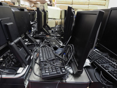 High resolution close up shot of old flat screens waiting to be sold or recycled or moved out from office.