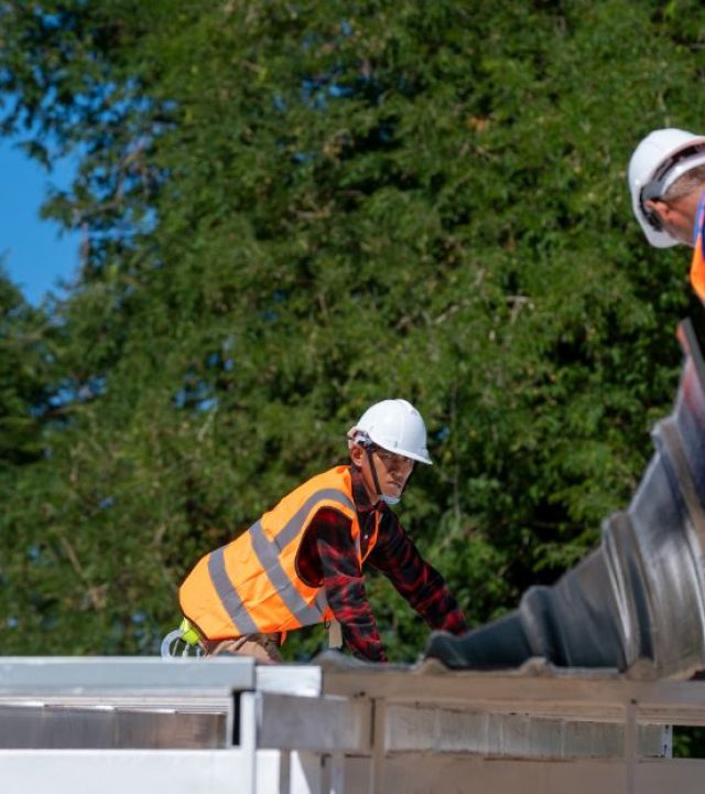 PureSafe asbestos removal services A close-up of a professional providing asbestos removal service work in NSW, Auburn, Sydney-Australia.